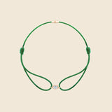 grünes Kordarmband mit ovalem Lab Diamanten mit Fassung in Rose