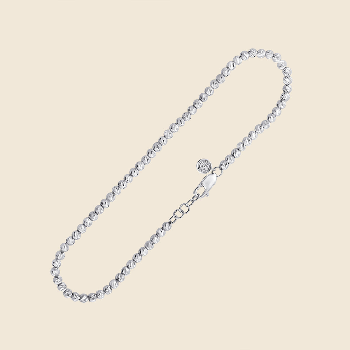 Armband mit durchgehenden Goldperlen in Weißgold