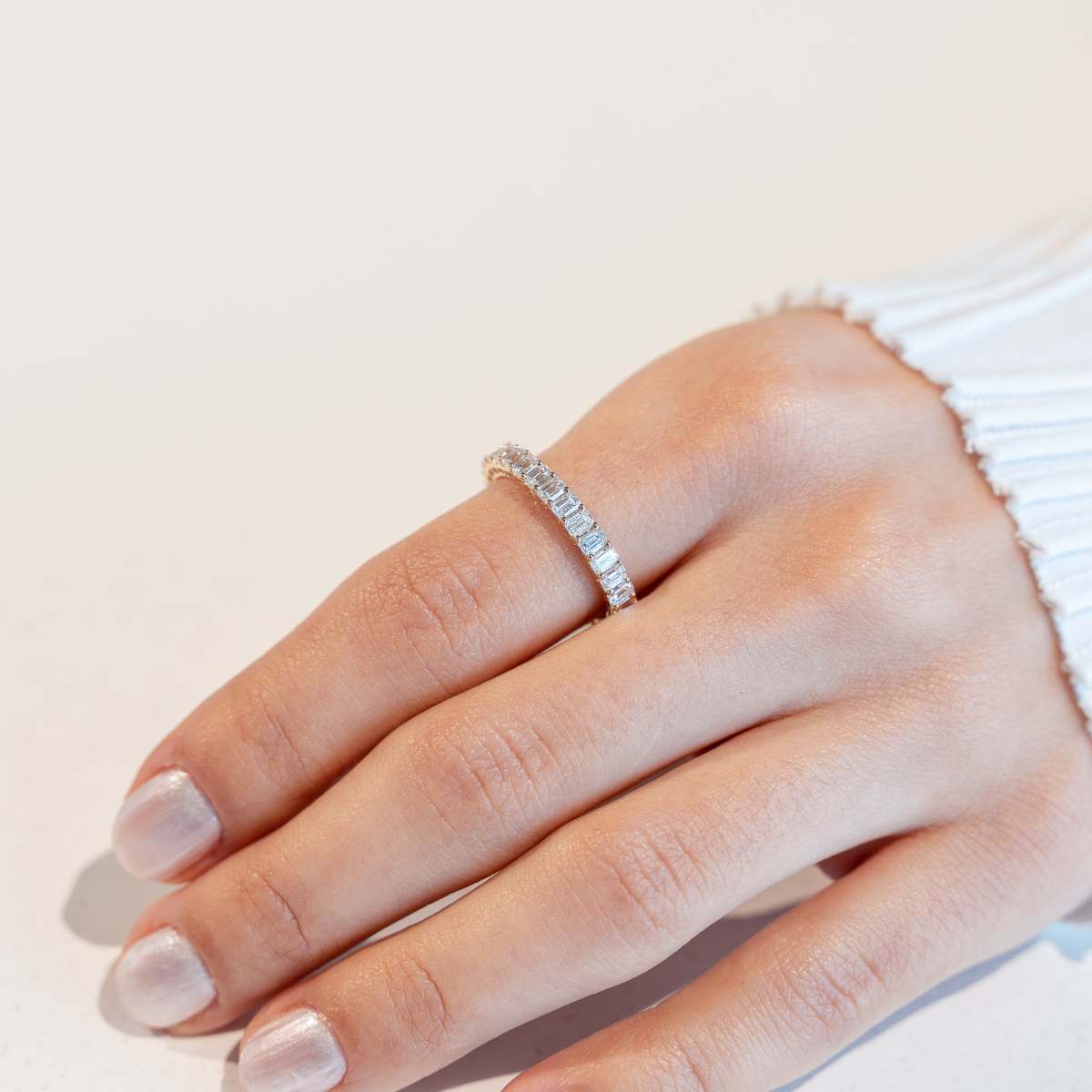 Peculiar Emerald Eternity Band