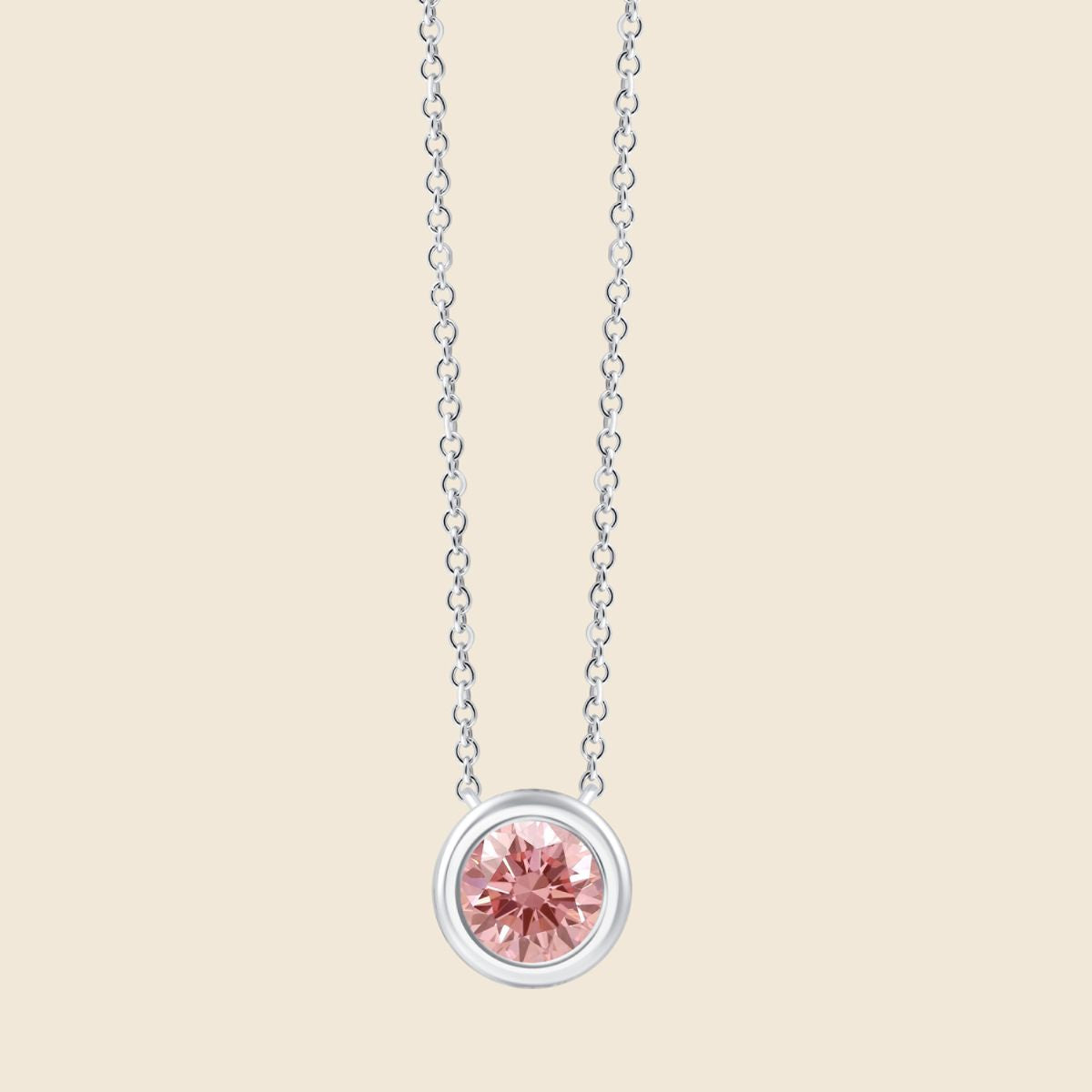 Elegante Halskette aus Weißgold mit rundem rosa Diamant in Zargenfassung