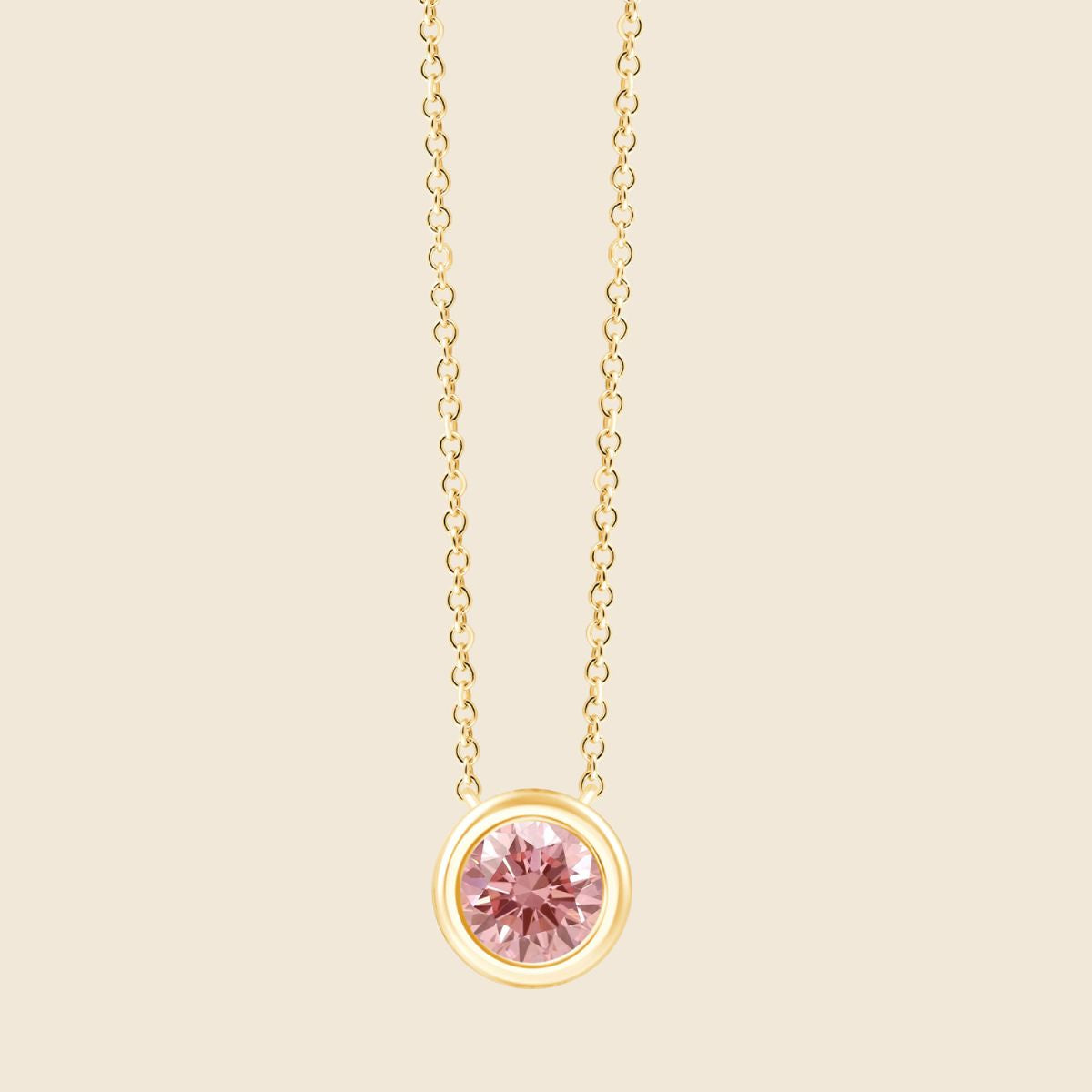 Feine Halskette aus Gelbgold mit rundem rosa Diamanten in Zargenfassung