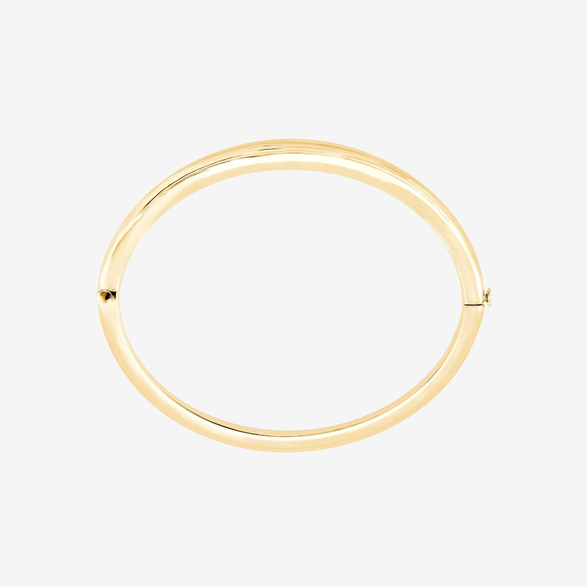 Runder Armreif in Gold mit seitlichem Verschluss in Frontalansicht