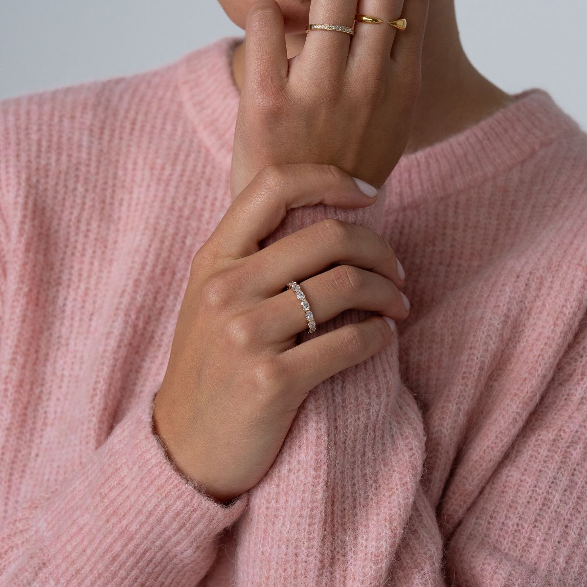 Peculiar Sleeping Oval Eternity Band