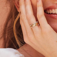 Peculiar Pinched Diamond Band