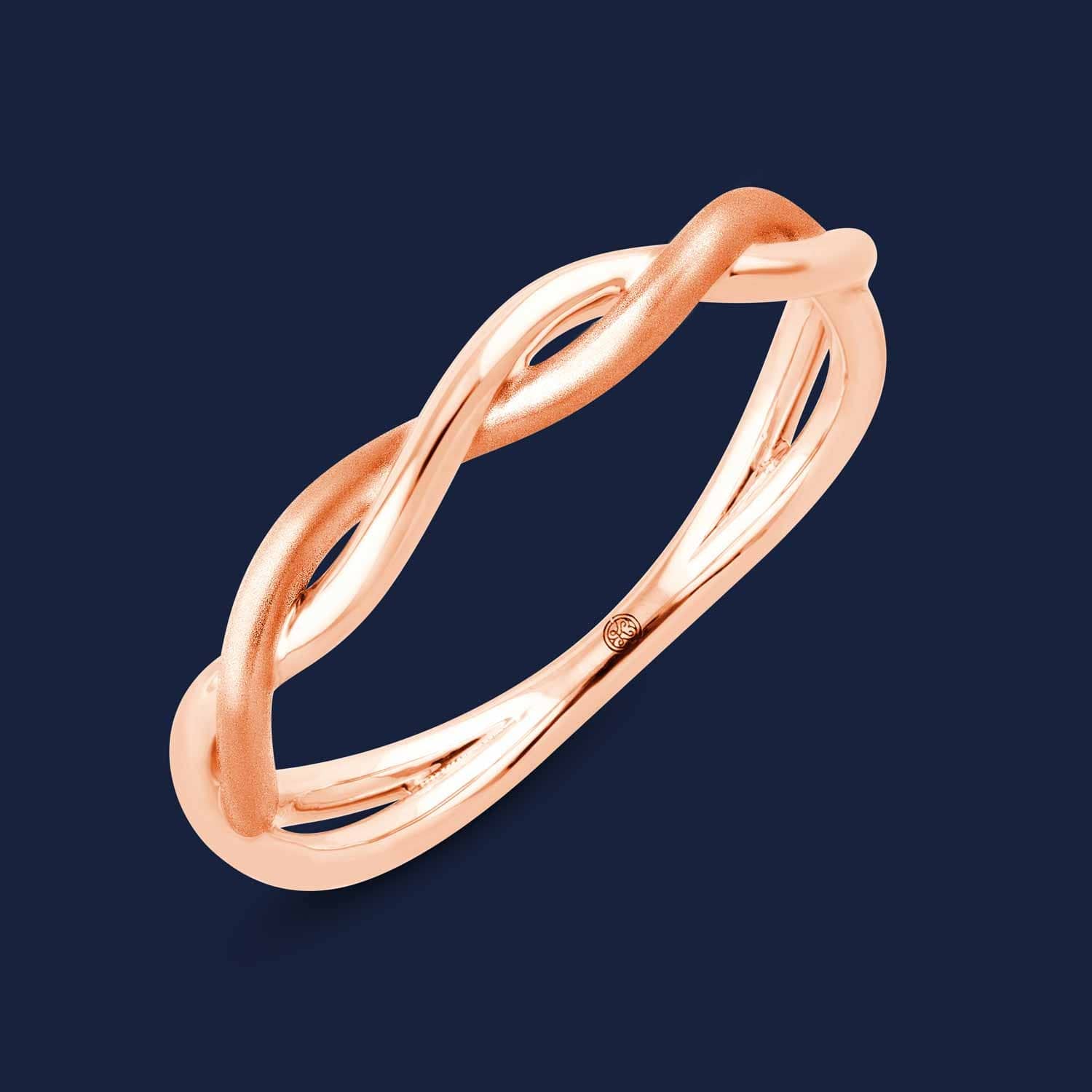 Eleganter Ring in Rose mit geflochtenem Muster