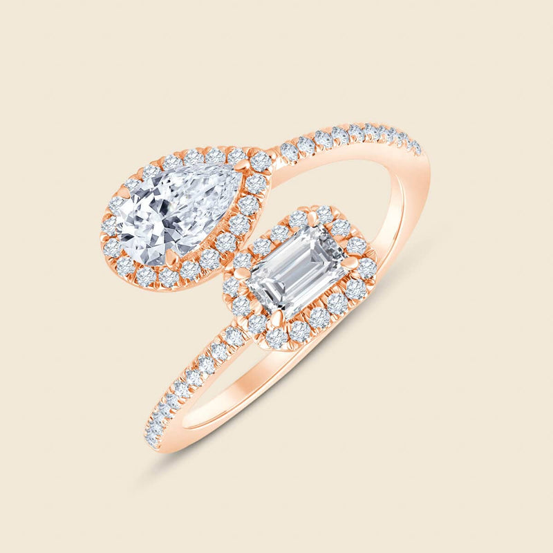 Rosegoldener Ring mit den Diamantschliffen Tropfen und Smaragd