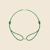 grünes Kordarmband mit Lab Diamanten in Smaragd-Schliff mit Fassung Rose  