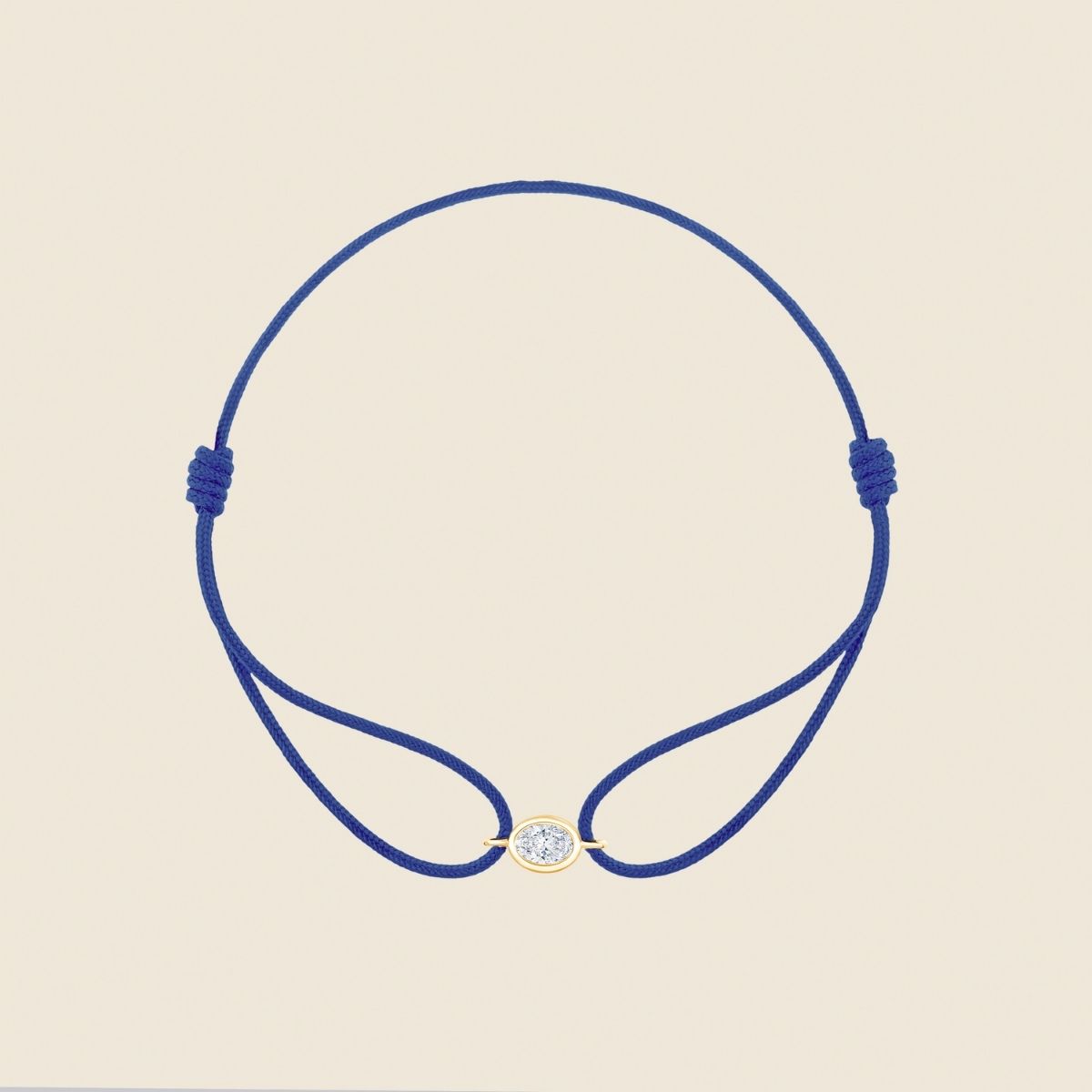 blaues Kordarmband mit ovalem Lab Diamanten in goldener Fassung