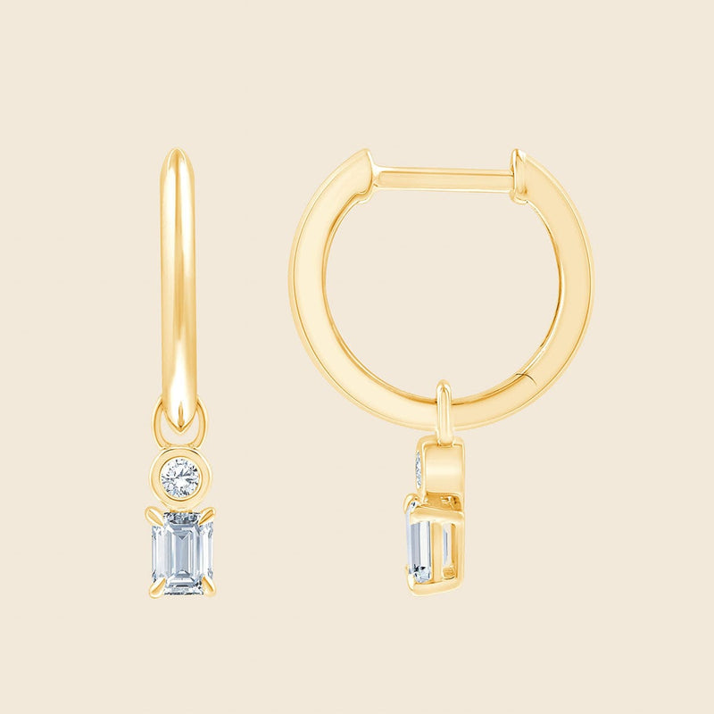 Ohrhänger mit rund- und smaragtgeschliffenen Lab Diamanten in Gelbgold