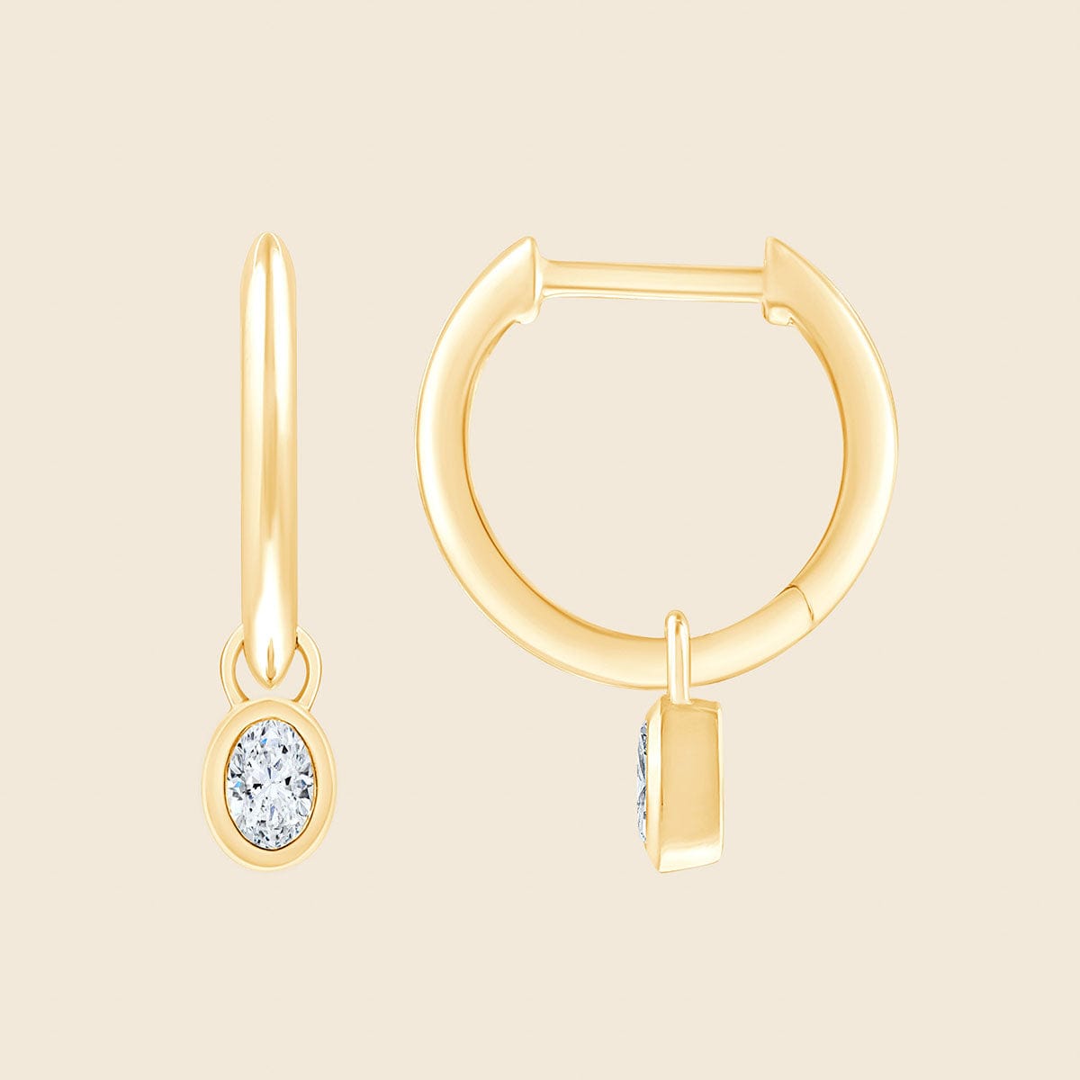 Ohrringe in 14k Gold mit ovalem Diamanten in Kesselfassung