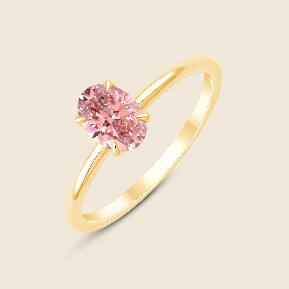 Goldener Ring mit pinken Lab-Diamant im Ovalschliff