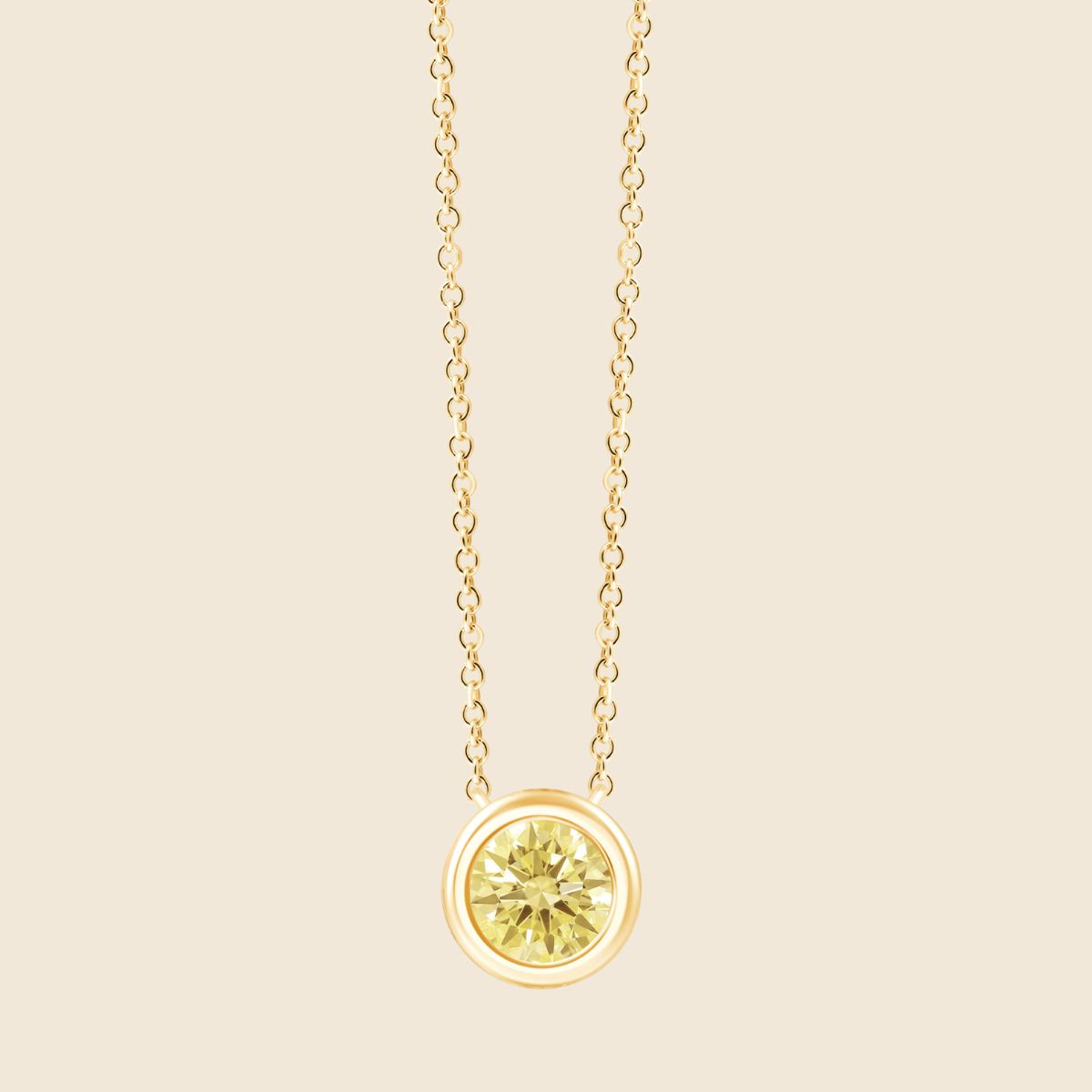 Feine Halskette aus Gelbgold mit rundem gelbem 0.5ct Diamanten in Zargenfassung