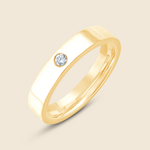 Ehering aus Gelbgold mit kleinem Lab Diamanten im Rundschliff