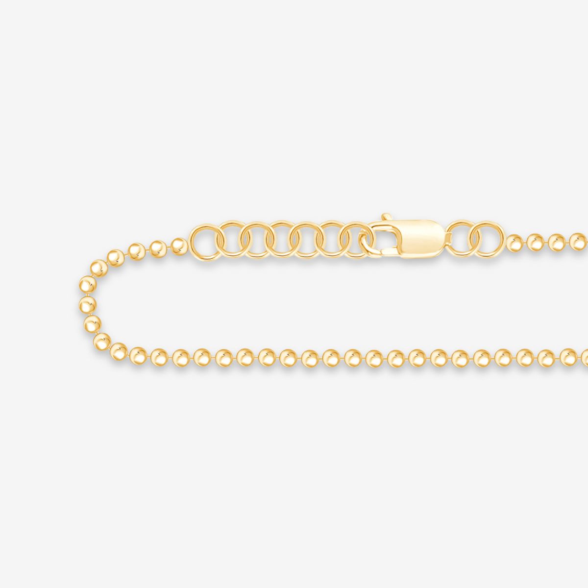 Gelbgoldene Kugelkette – Detailansicht des Karabinerverschlusses.