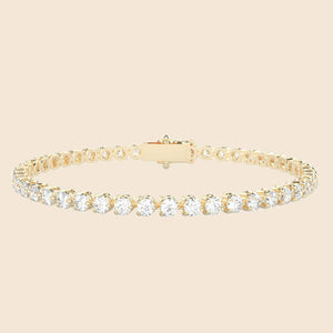 Modernes Tennisarmband in Gelb mit Lab Diamanten gehalten von drei Zacken